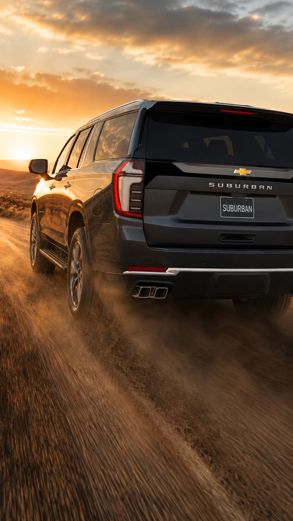 Chevrolet Silverado rear angle trail dust