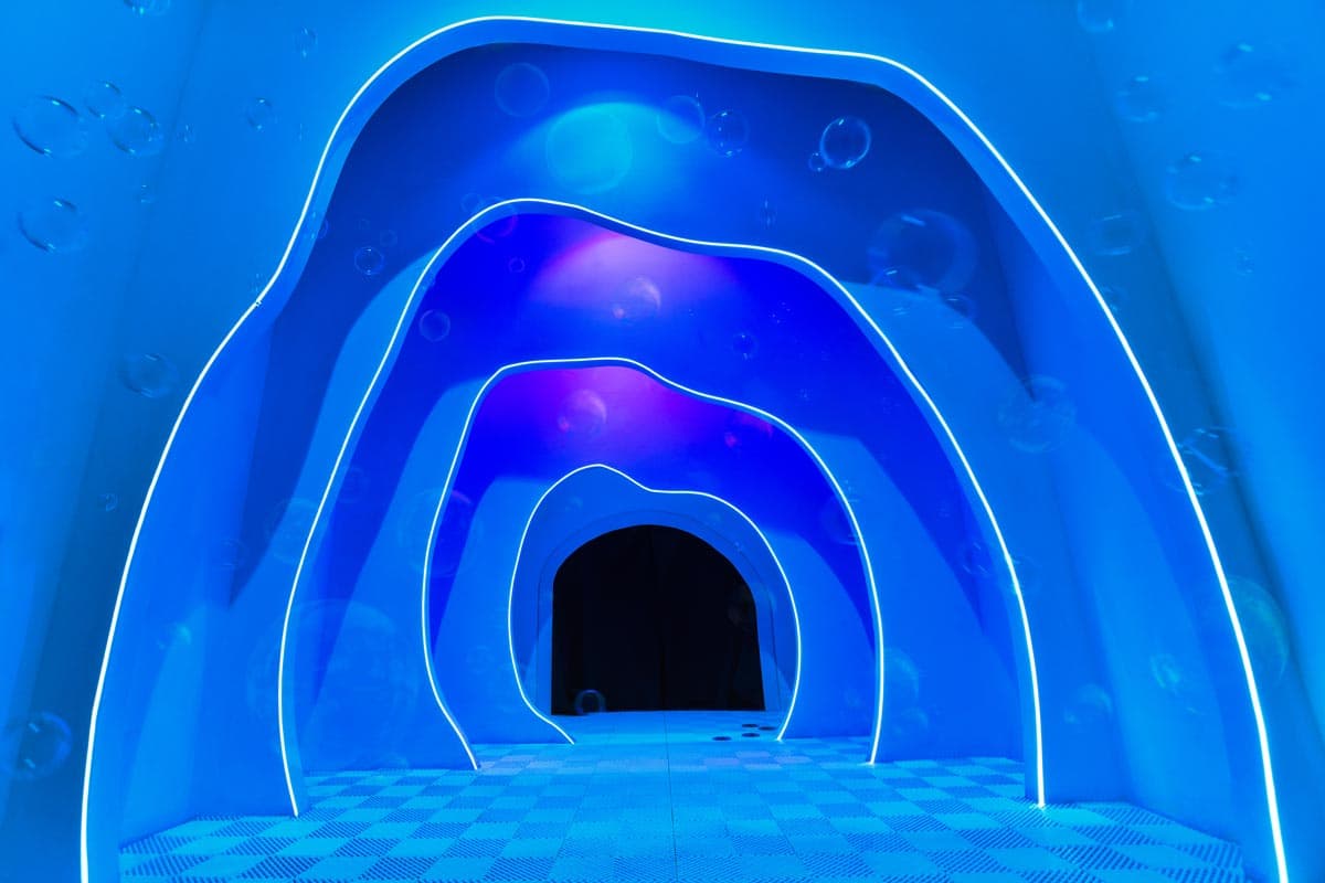 Oakland Place glowing blue ice tunnel