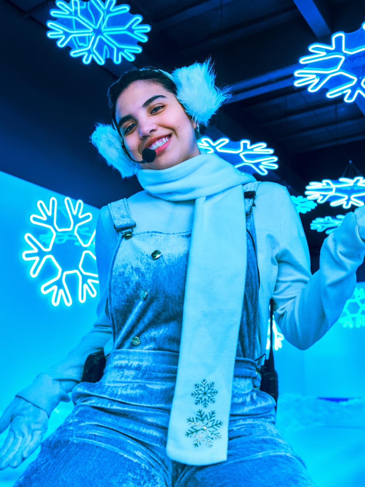Visitor enjoying the blue snow room