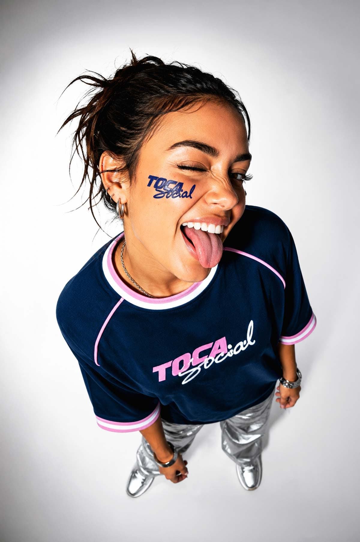 Model winking with TOCA Social cheek sticker
