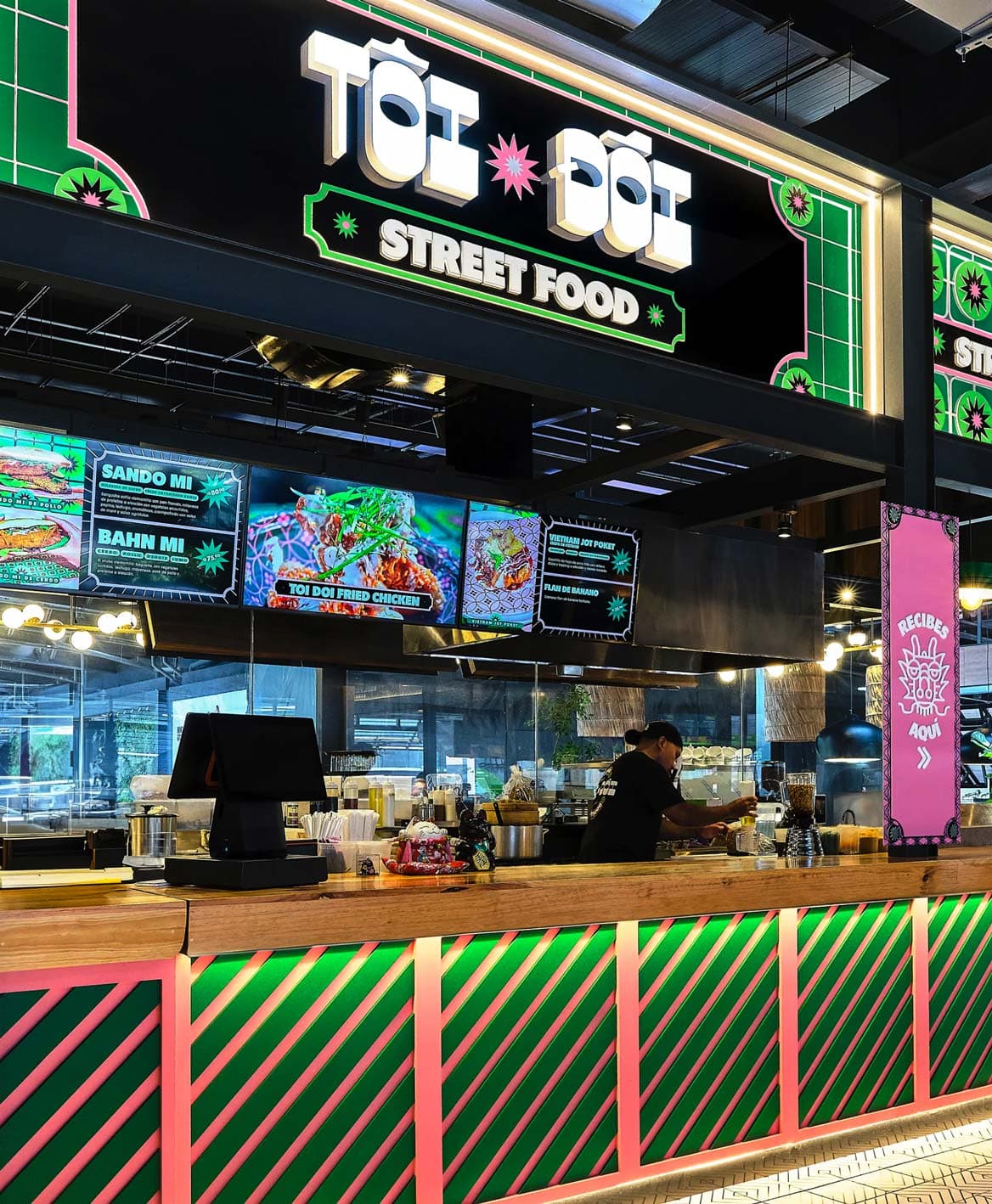 Front view of Toi Doi kiosk counter and digital menu displays