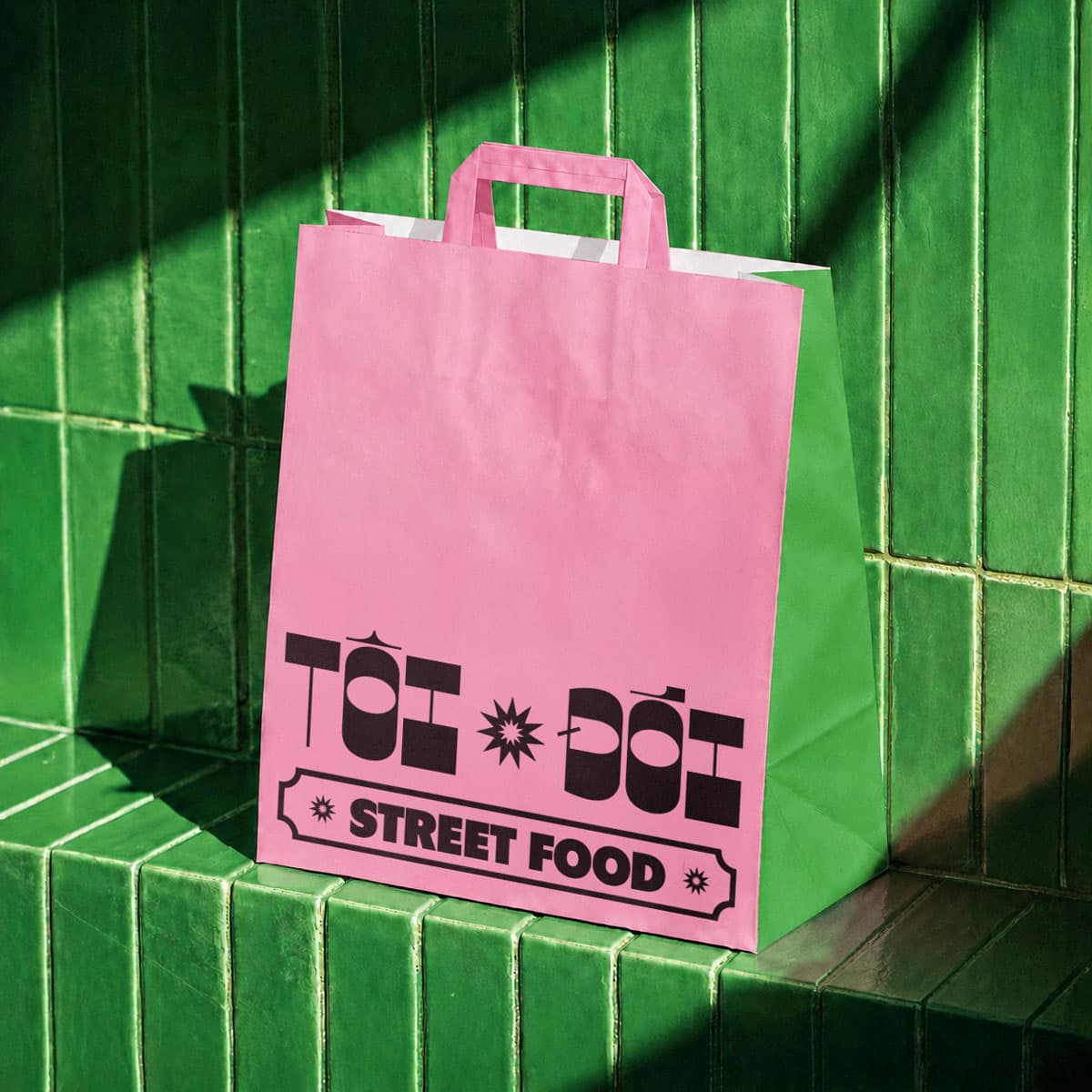 Pink branded takeaway bag